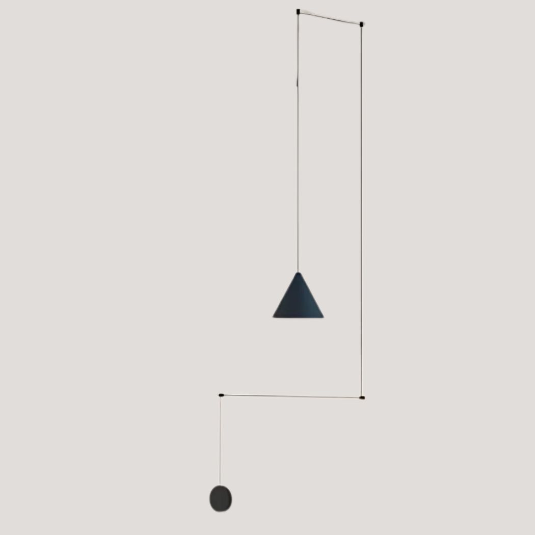 Minimalist modern pendant with decorative exposed wire presented on a grey wall