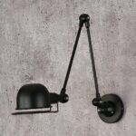 Adjustable retro black industrial LED wall light on grey background