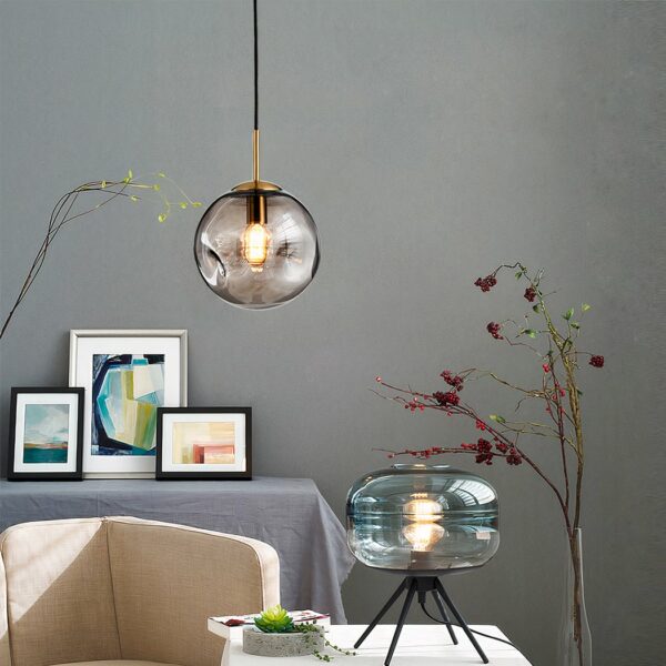 Ball-shaped blown glass suspension worked in a living room
