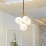 Cluster-shaped corridor pendant with 5 white balls, suspended from a gold stem