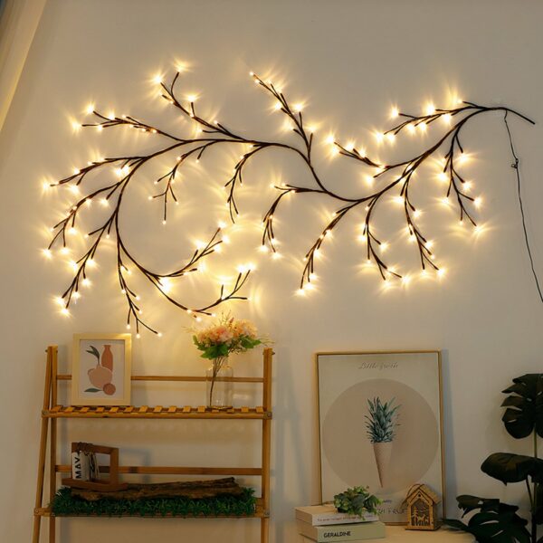 Garland-type headboard wall light, positioned on a wall in a bedroom