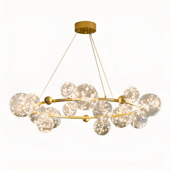 Hanging chandelier, with several glass balls of different sizes attached to a gilded metal circle, suspended by 3 wires from the ceiling light base. On a white background.