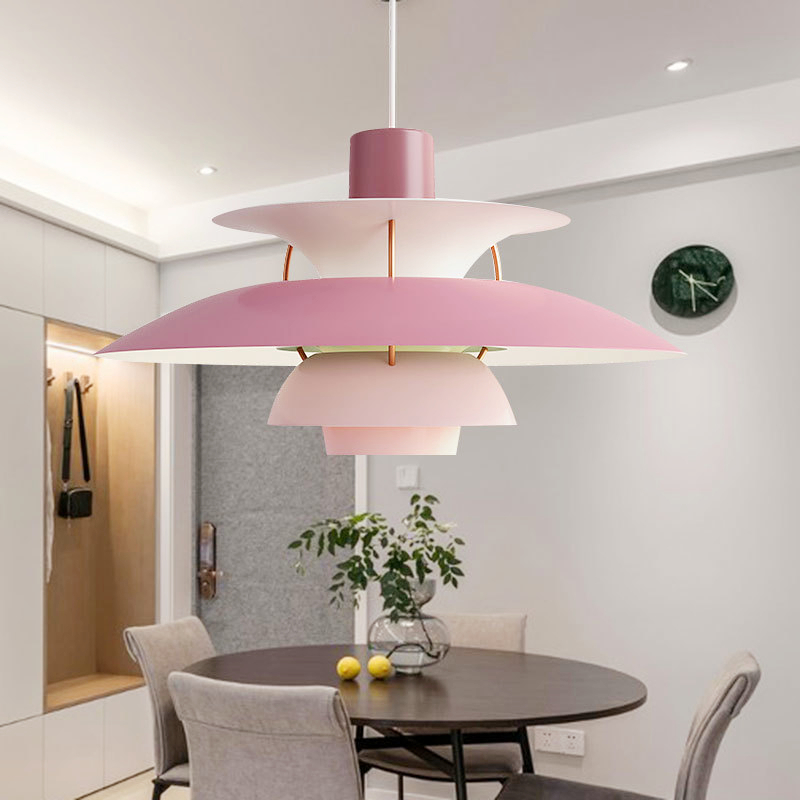 High-quality Danish-design vintage hanging lamp above a restaurant-style dining table