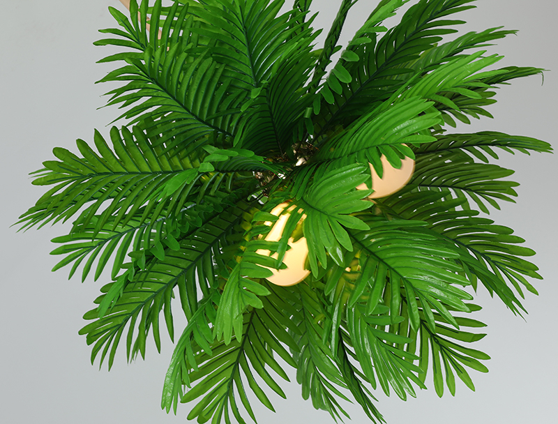 Jungle hanging lamp in the shape of palm leaves