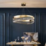 lED crystal drop chandelier with tassel above a dining room