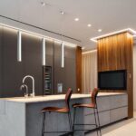 Simple Nordic modern LED suspension tube above a kitchen