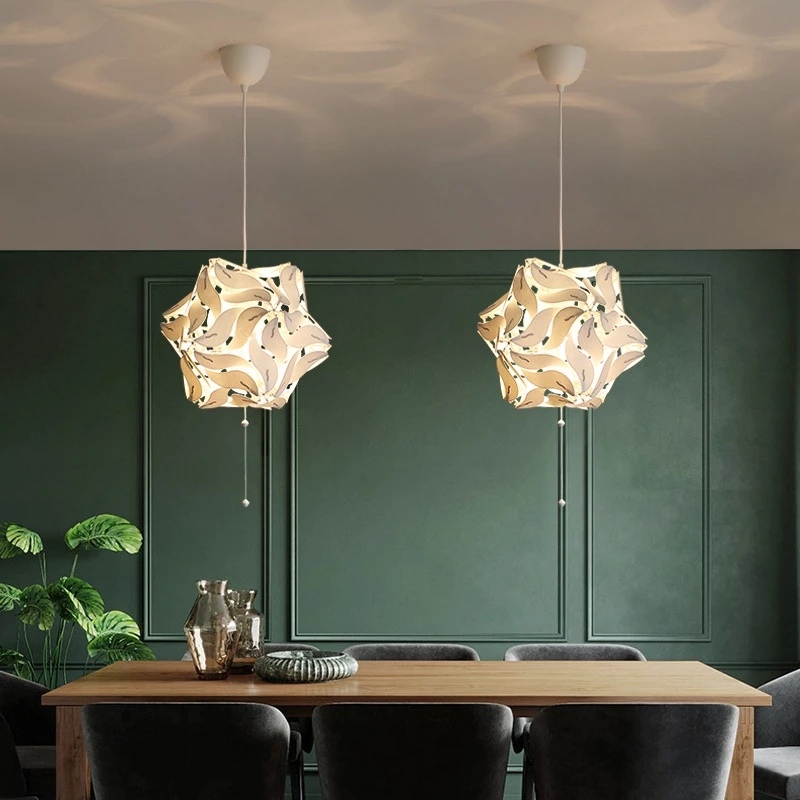 Luxurious retractable flower hanging above a dining table