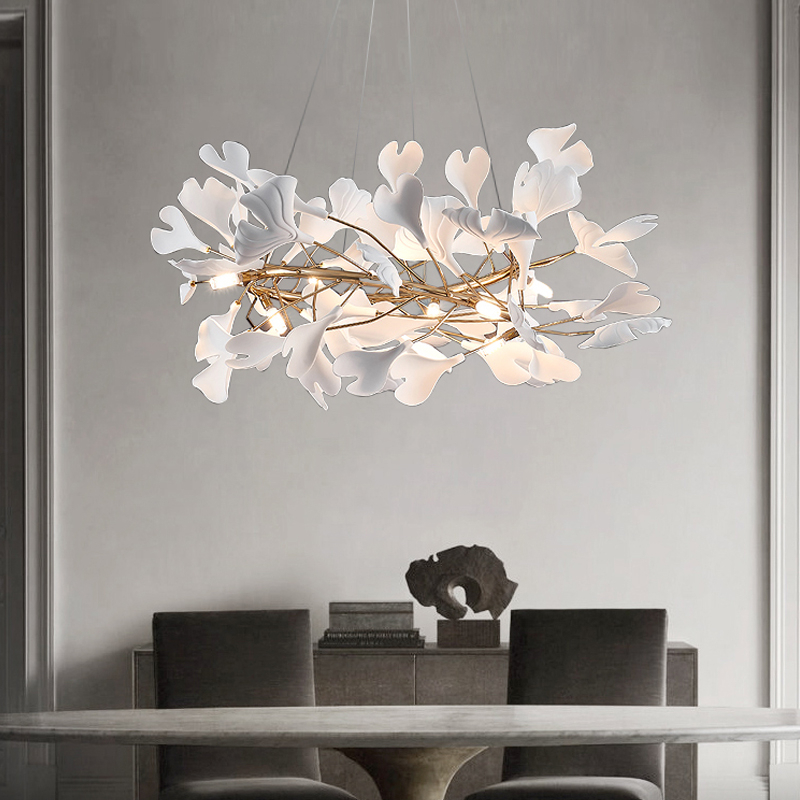 Slim, elegant white leaf suspension presented on a black background