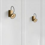 Modern design magnetic LED reading light wall light installed twice on a white wall