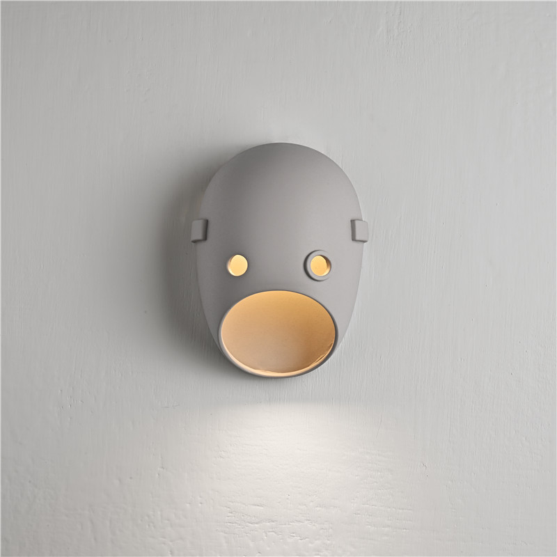 Mask-shaped ceramic wall lamp