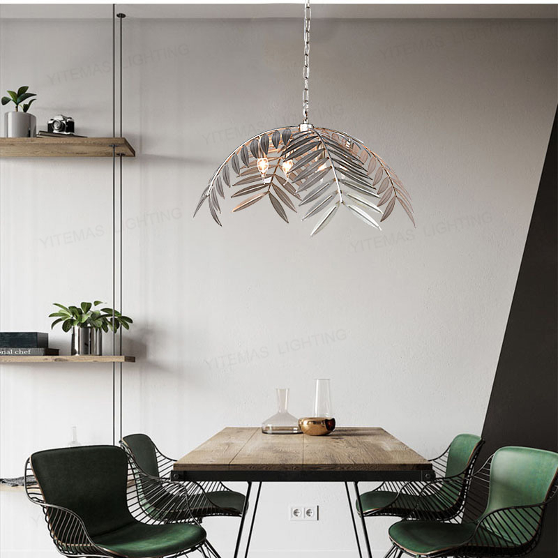 Hanging leaf in glossy finish presented suspended in gold