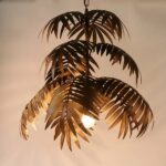 Modern-style leaf suspension presented on a beige background