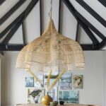 Modern rattan pendant with petals on a white background