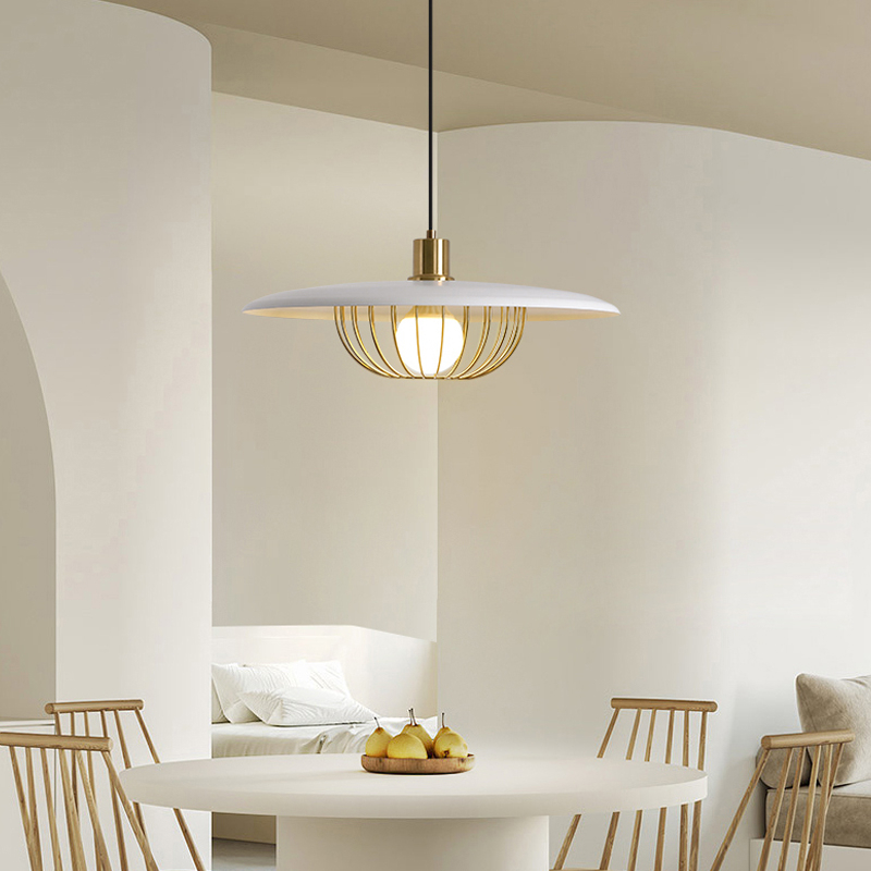 Simple modern retro chic flat pendant above a dining table in a modern setting