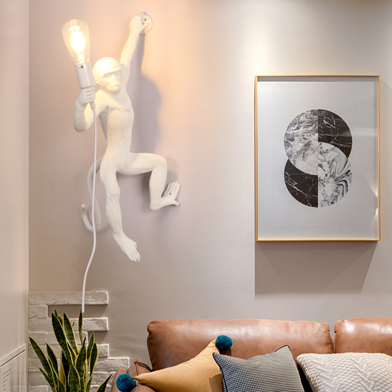 white monkey wall light on a living room wall