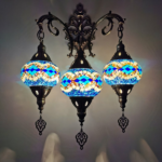 Oriental round wall lamp design blue mosaic shown lit