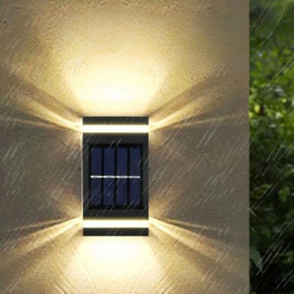 Rectangular outdoor solar LED wall light on a garden wall