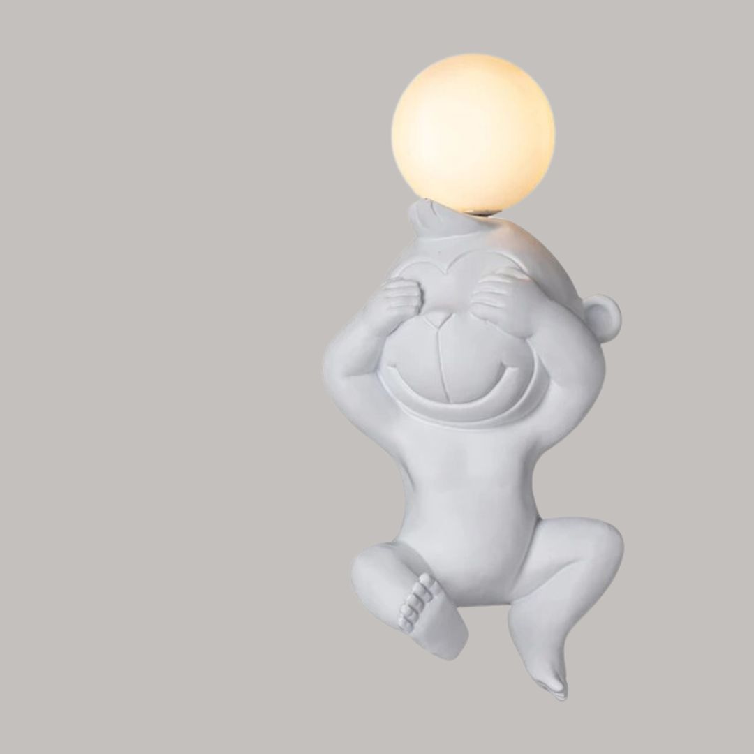 Resin LED wall lamp in the shape of a monkey