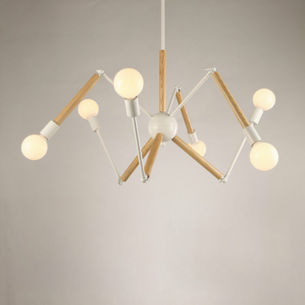 Spider chandelier, made of white metal rods and wood, with a bulb at the end of each rod. Suspended, a white wall in the background.