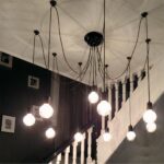 Retro vintage black industrial spider pendant presented hanging