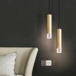 Nordic semi-transparent tubular living room pendant next to a white sofa