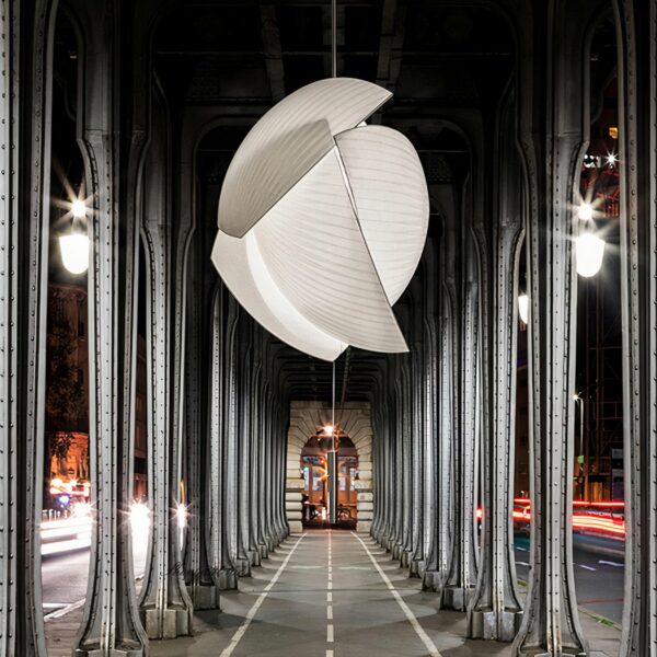Shell-shaped fabric hanging lamp in Japanese design on a grey and black background