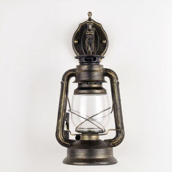 Vintage and industrial wall light in glass and metal on grey background