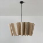 Vintage Japanese-style decorative fabric hanging on a grey background