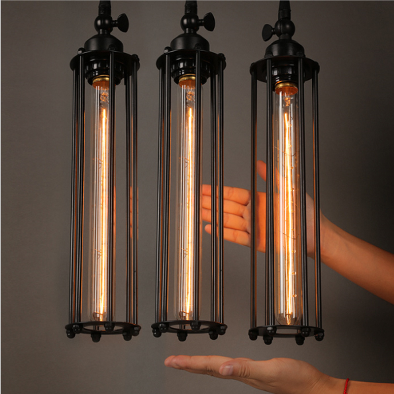 Retro vintage industrial suspension presented several times above a black cabinet