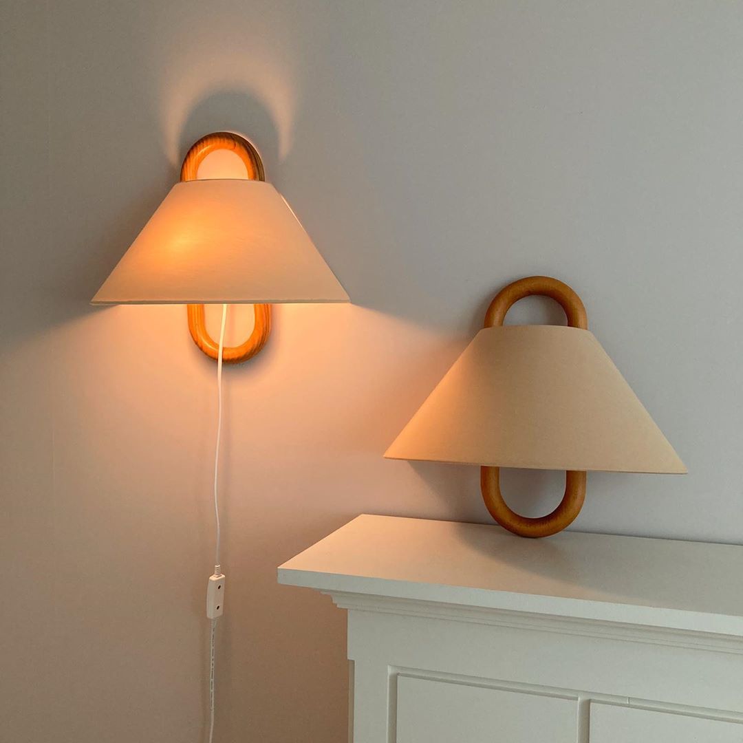 Vintage wood wall lamp with beige fabric shade