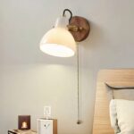 Adjustable Japanese-style LED wall light on grey background