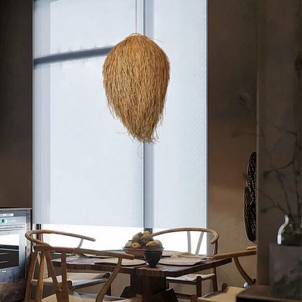 Rattan chandelier, ball-shaped and covered with falling wires. Above, a square wooden table with 4 wooden chairs. Behind, a large floor-to-ceiling window.