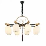 Black Japanese-style chandelier with tree decoration in a circular arc in the center, from which a chain hangs from the ceiling at the top, and 8 straight arms at the bottom, at the end of which hang white frosted glass shades in the shape of a cylindrical bell. On a white background.