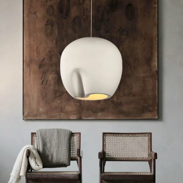 Grey LED pendant chandelier with minimalist Nordic design on a brown and grey background