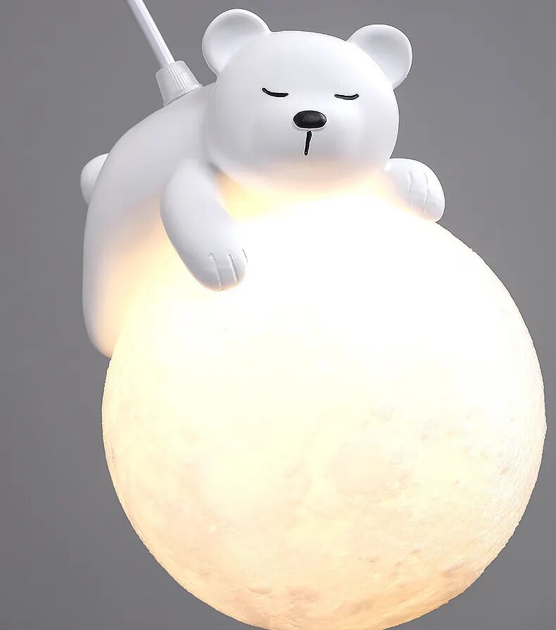 Hanging teddy bear on the moon