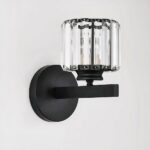 Luxurious Nordic design LED wall light in stainless steel and crystal on a grey background