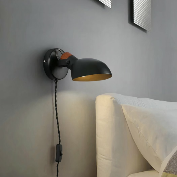Nordic-style rotating LED wall light in aluminium on grey background