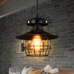 Vintage and industrial LED chandelier in lit metal on grey background