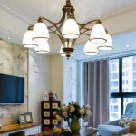 in a luxurious living room, a suspended wrought-iron chandelier with several heads is lit up
