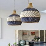 two canard-blue rattan hangers in bohemian style in a bright living room
