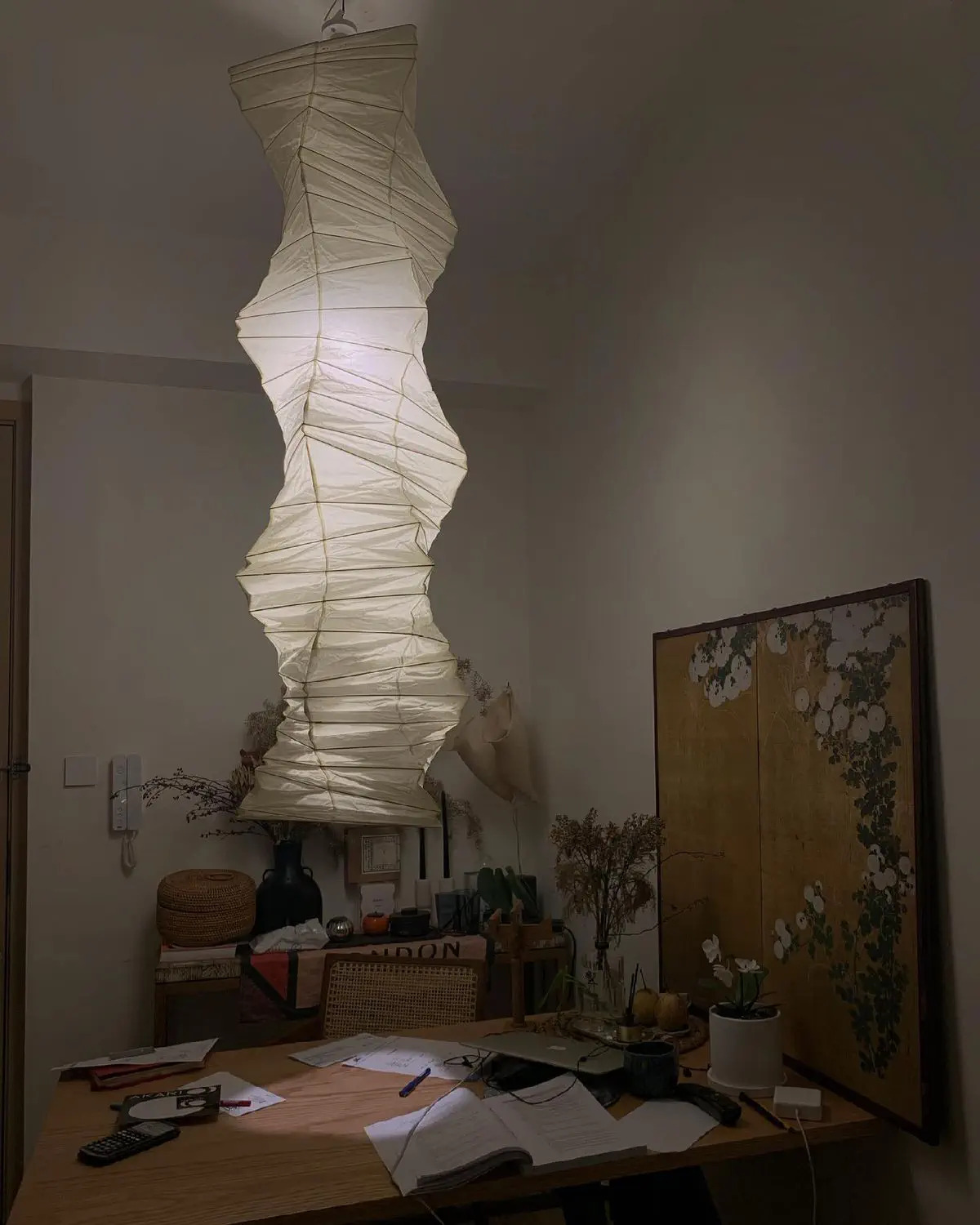 Large white suspension made of Japanese pleated paper