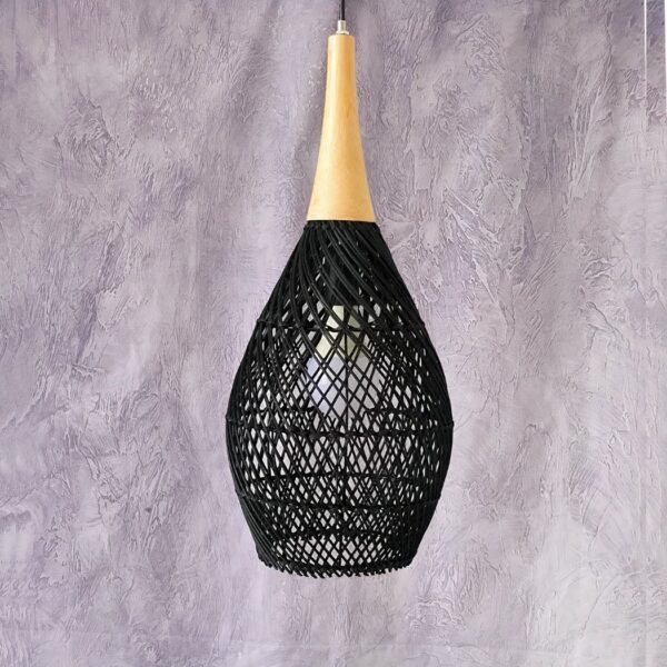 Classic, hand-woven bamboo chandelier in black with a mauve background.