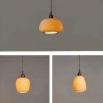 Traditional hand-crafted ceramic hanging lamp in three versions, suspended from the ceiling, lit and with a gray background.