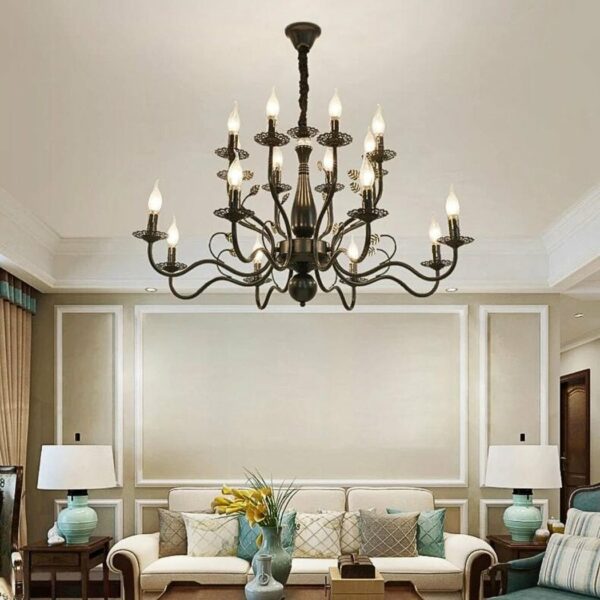 in a gray-toned living room, a large black wrought-iron chandelier in the Baroque style